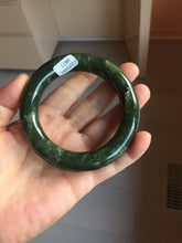 Load image into Gallery viewer, 55.2mm certified 100% Natural dark green/black Ocean Waves chubby round cut nephrite bangle HN184-0877