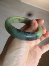 Load image into Gallery viewer, 51mm 100% Natural yellow/blue/brown/black carved bunny/window Xiu Jade (Serpentine) bangle XY11