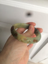 Load image into Gallery viewer, 51mm 100% Natural yellow/blue/brown/black carved bunny/window Xiu Jade (Serpentine) bangle XY11