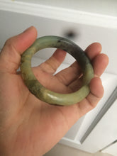 Load image into Gallery viewer, 51mm 100% Natural yellow/blue/brown/black carved bunny/window Xiu Jade (Serpentine) bangle XY11
