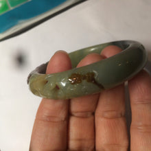 Load image into Gallery viewer, 51mm 100% Natural yellow/blue/brown/black carved bunny/window Xiu Jade (Serpentine) bangle XY11