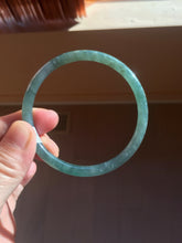 Load image into Gallery viewer, 57mm Certified Type A 100% Natural light green/blue/gray/brown with flying snow Guatemala slim round cut Jadeite bangle PD57-5536