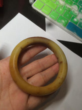 Load image into Gallery viewer, 56mm 100% Natural yellow/red/brown carved cat and flowers Xiu Jade (Serpentine) bangle XY60