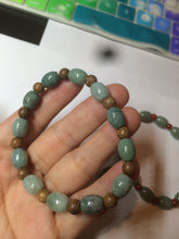Load image into Gallery viewer, 9.2x8.1mm 100% natural type A green jadeite jade olive shape(LU LU TONG) beads bracelet AZ23
