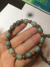 Load image into Gallery viewer, 9.2x8.1mm 100% natural type A green jadeite jade olive shape(LU LU TONG) beads bracelet AZ23
