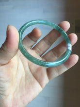 Load image into Gallery viewer, 57mm Certified Type A 100% Natural light green/blue/gray/brown with flying snow Guatemala slim round cut Jadeite bangle PD57-5536
