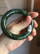 Load image into Gallery viewer, 55.2mm certified 100% Natural dark green/black Ocean Waves chubby round cut nephrite bangle HN184-0877
