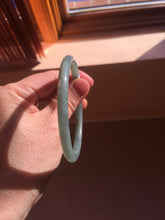 Load image into Gallery viewer, 60mm Certified Type A 100% Natural light green/blue with flying snow Guatemala slim round cut Jadeite bangle PD70-8146
