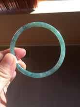 Load image into Gallery viewer, 57mm Certified Type A 100% Natural light green/blue/gray/brown with flying snow Guatemala slim round cut Jadeite bangle PD57-5536
