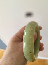 Load image into Gallery viewer, 53.1 mm 100% Natural yellow dots and green Xiu Jade (Serpentine) Chubby bangle T179
